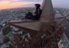 Экстремал забрался на шпиль здания на Котельнической набережной
